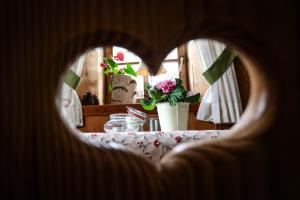 Postel nebo postele na pokoji v ubytování Bei Max - Hotel Garni Kirchenwirt