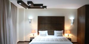 Postel nebo postele na pokoji v ubytování Eden Hotel