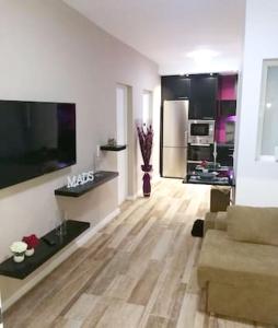 Televiisor ja/või meelelahutuskeskus majutusasutuses 3 bedrooms apartement with wifi at Las Palmas de Gran Canaria