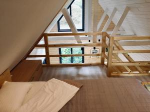 Posteľ alebo postele v izbe v ubytovaní BagriWood Lodges (Лоджі БагріВуд)