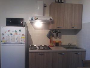 A kitchen or kitchenette at CASA MARTA SANDO Még 22 kép