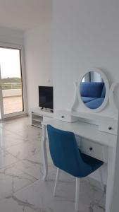 TV a/nebo společenská místnost v ubytování Apartments Bibic