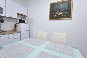 Kuchyňa alebo kuchynka v ubytovaní Apartments Jere Proto