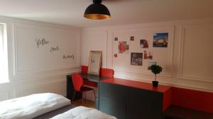 Postel nebo postele na pokoji v ubytování London Apartments