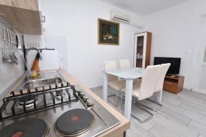 Kuchyňa alebo kuchynka v ubytovaní Apartments Jere Proto