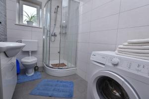 Kúpeľňa v ubytovaní Apartments Jere Proto