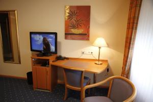TV a/nebo společenská místnost v ubytování Hotel Anika
