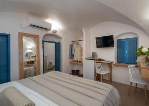 Postel nebo postele na pokoji v ubytování Nalas Suites + 37 fotografií