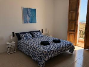 Posteľ alebo postele v izbe v ubytovaní Apartamento Puerto de Sagunto Playa