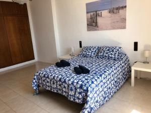 Posteľ alebo postele v izbe v ubytovaní Apartamento Puerto de Sagunto Playa