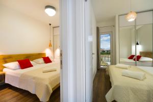 Postel nebo postele na pokoji v ubytování Bulli Croatia