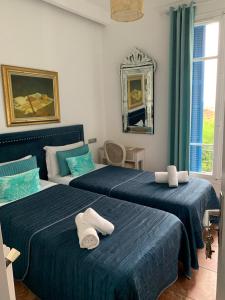 Letto o letti in una camera di Hotel Normandy