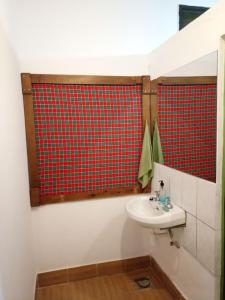 Et badeværelse på KILIMANJARO MAD MONKEY'S HOTEL