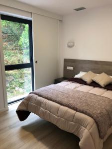 Photo de la galerie de l'établissement Apartamentos Compostela, à Lobios