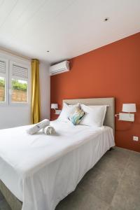 Ένα ή περισσότερα κρεβάτια σε δωμάτιο στο Sealake Villas