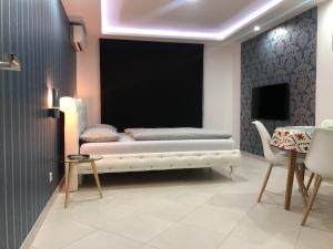 TV a/nebo společenská místnost v ubytování Apartment Ajla