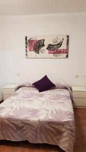 Postel nebo postele na pokoji v ubytování Apartamento turístico Dayma 2