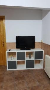 TV a/nebo společenská místnost v ubytování Apartamento turístico Dayma 2