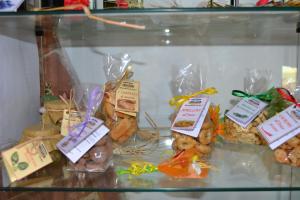 a display case filled with different types of food at Agriturismo Marruchetone Vecchio in Marsiliana