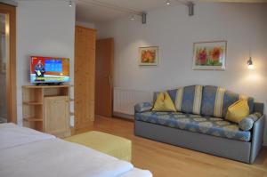 Telewizja i/lub zestaw kina domowego w obiekcie Abanico Appartements