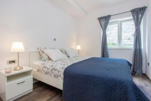 Posteľ alebo postele v izbe v ubytovaní Apartmani Bedem