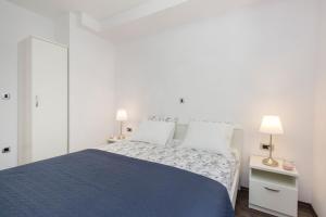 Posteľ alebo postele v izbe v ubytovaní Apartmani Bedem