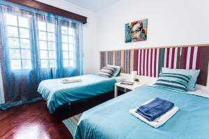 Llit o llits en una habitació de Casa Azul Natura