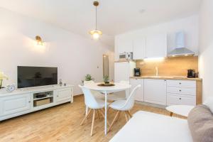 Kuchyňa alebo kuchynka v ubytovaní Apartmani Bedem