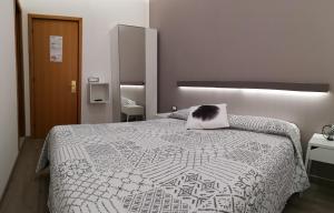 Postel nebo postele na pokoji v ubytování Albergo Felice