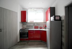 Kuchyň nebo kuchyňský kout v ubytování Apartment Kala