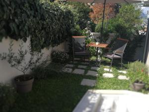 Giardino di Room with garden