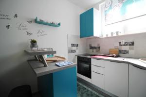 Kuchyň nebo kuchyňský kout v ubytování Apartment Kala