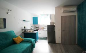 Kuchyň nebo kuchyňský kout v ubytování Apartment Kala