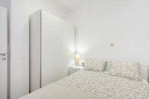 Posteľ alebo postele v izbe v ubytovaní Apartmani Bedem