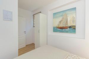 Posteľ alebo postele v izbe v ubytovaní Apartmani Bedem