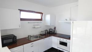 Kuchyňa alebo kuchynka v ubytovaní Apartament Reda