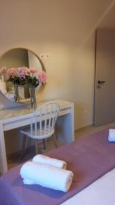 A bed or beds in a room at VILLA ANTHIMOS
