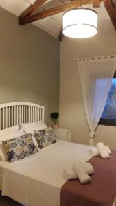 A bed or beds in a room at VILLA ANTHIMOS