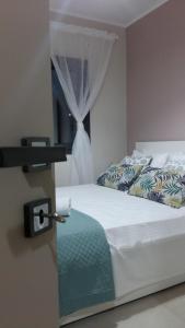 A bed or beds in a room at VILLA ANTHIMOS