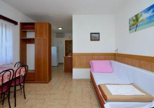 Postel nebo postele na pokoji v ubytování Apartments Stjepan