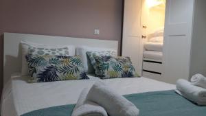 A bed or beds in a room at VILLA ANTHIMOS
