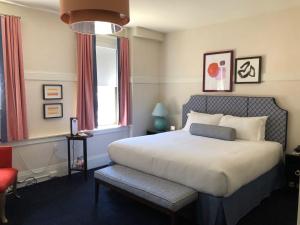 Postel nebo postele na pokoji v ubytování Hotel Triton