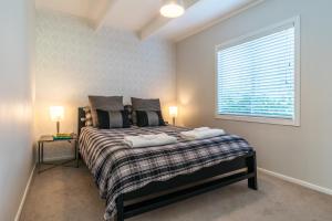 Posteľ alebo postele v izbe v ubytovaní Tikapa Moana Views