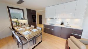 Kuchyň nebo kuchyňský kout v ubytování White Pearl Apartment 1.01 + 25 fotografií