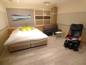 Postel nebo postele na pokoji v ubytování Hotel GOLF Hodogaya (Adult Only) + 23 fotografií