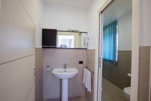Kúpeľňa v ubytovaní Porta Pispini Residence