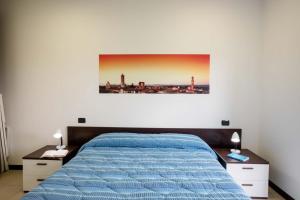 Posteľ alebo postele v izbe v ubytovaní Porta Pispini Residence