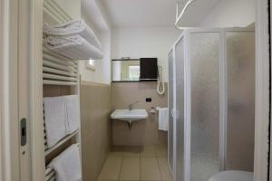 Kúpeľňa v ubytovaní Porta Pispini Residence