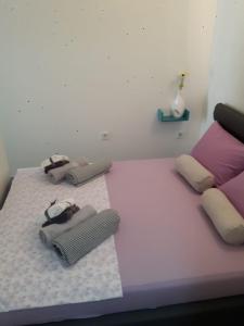 Postel nebo postele na pokoji v ubytování FINA M Studio Apartman