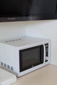 A kitchen or kitchenette at Luxury Apartment